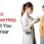 Nurse giving flu vaccine to adult during flu season